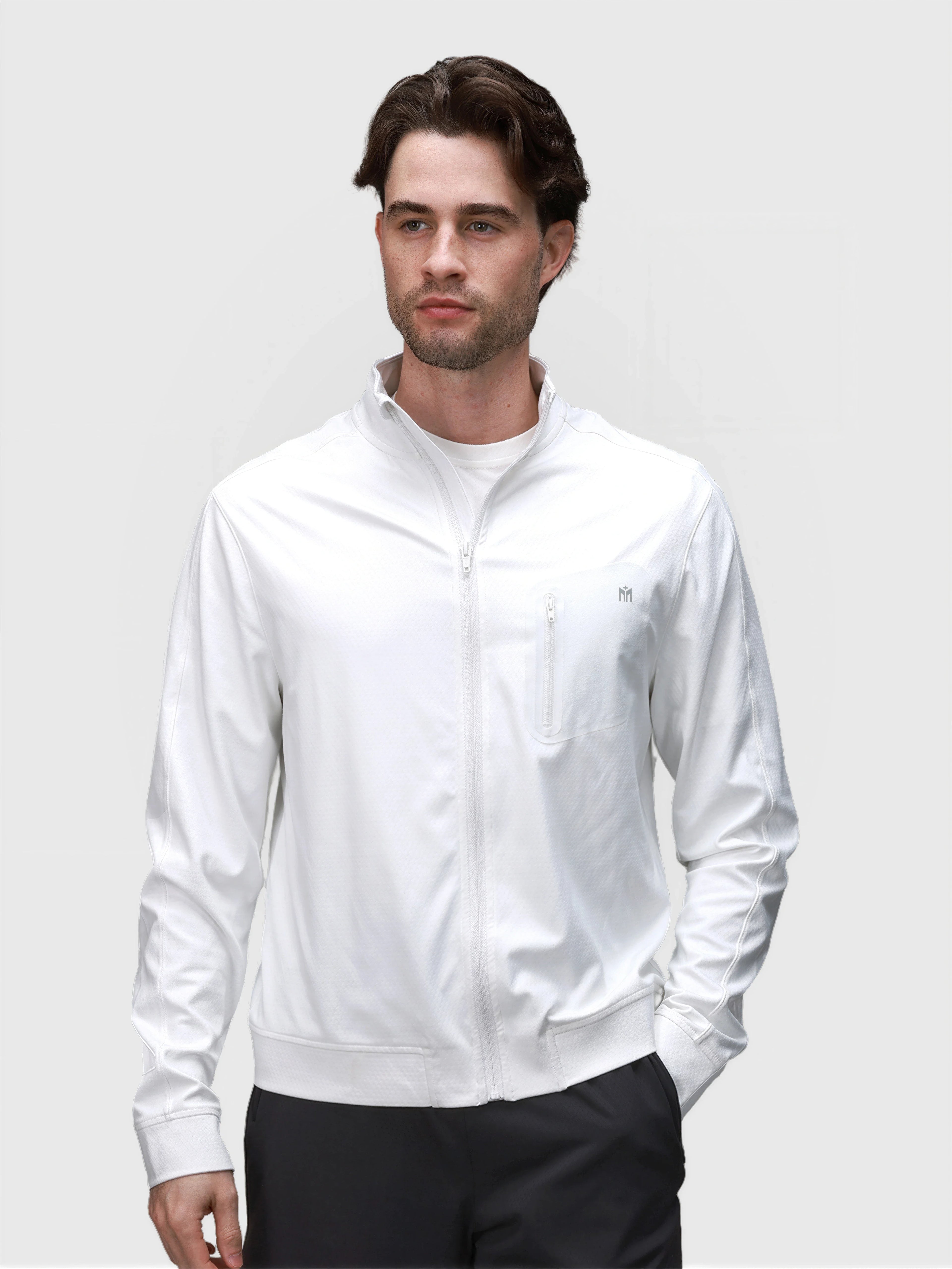 Man modeling white Echelon Jacket with zipper and chest pocket in pickleball clothing by MUEV