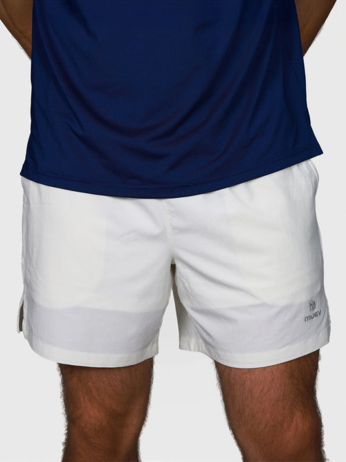 front view of man wearing Base Line Short in white by MUEV designed for pickleball shorts and padel apparel