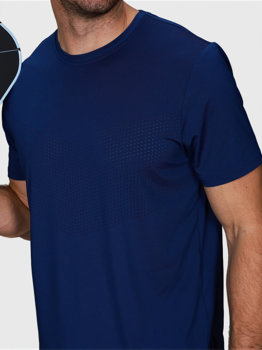 man wearing navy Chevron Tee by MUEV designed for padel and pickleball clothing with short sleeves