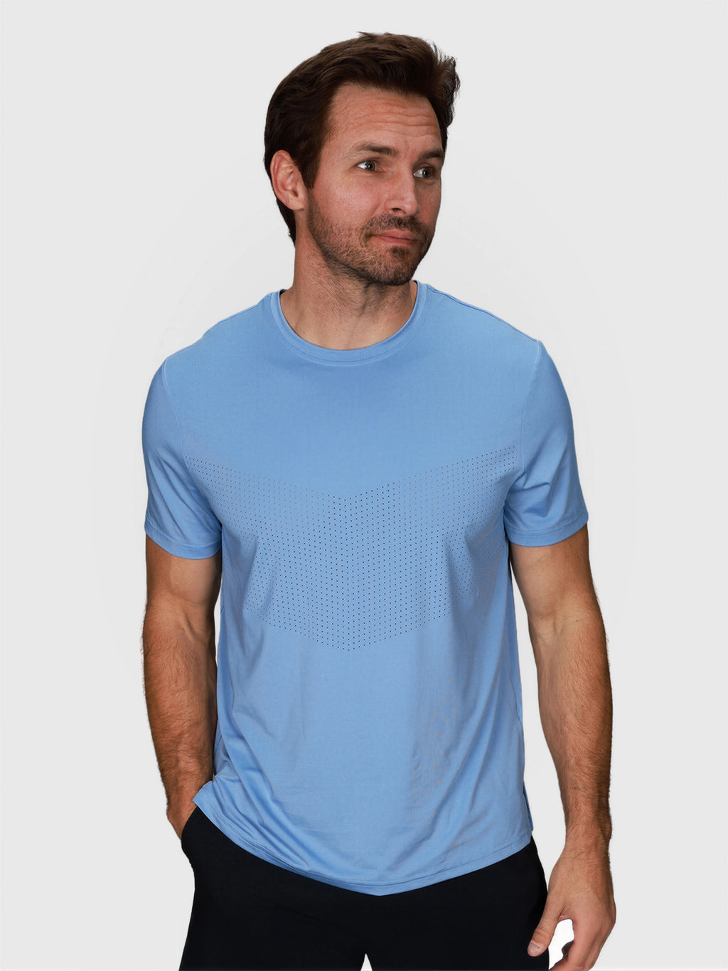 man modeling Cloud Blue Chevron Tee by MUEV designed for padel and pickleball clothing with short sleeves