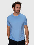 man modeling Cloud Blue Chevron Tee by MUEV designed for padel and pickleball clothing with short sleeves